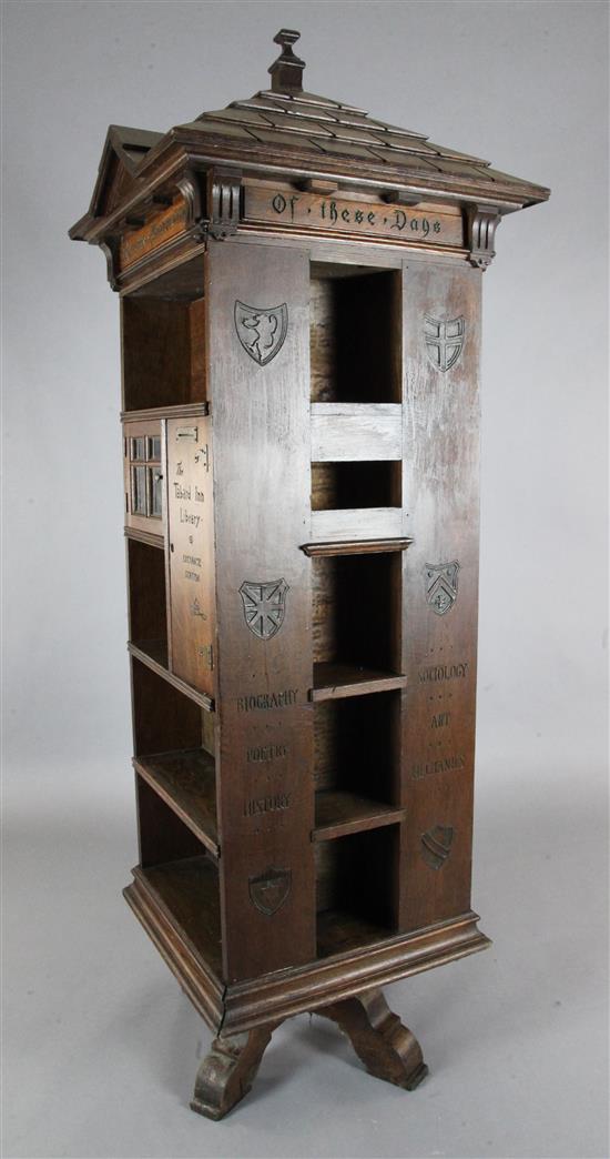 An early 20th century English Tabard Inn Library oak revolving bookcase W.2ft 3in. sq. H.6ft 6in.